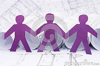 Paper little men on the house project Stock Photo