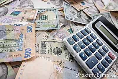 paper money Ukraine with dollar and calculator Stock Photo