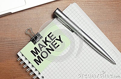 paper note with text written MAKE MONEY. Concept of financial planning. Make more extra money from parttime side hustle or second Stock Photo