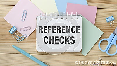 Paper plate with text REFERENCE CHECKS. Stock Photo