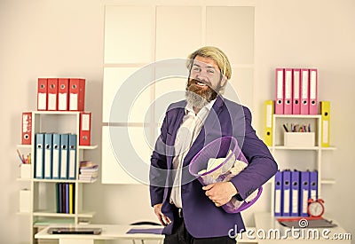 Paper recycling. Destruction of evidence. No evidence. Waste paper collection. Reuse of resources. Office worker digging Stock Photo