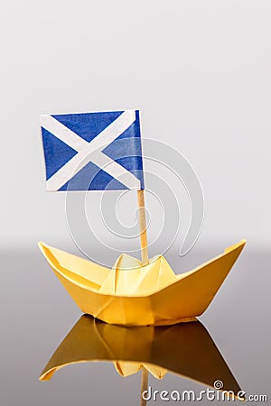 Paper ship with scots flag Stock Photo