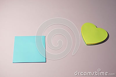Paper stickers on a pink background Stock Photo