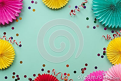 Paper texture flowers on green background. Birthday, holiday or party background. Flat lay style Stock Photo