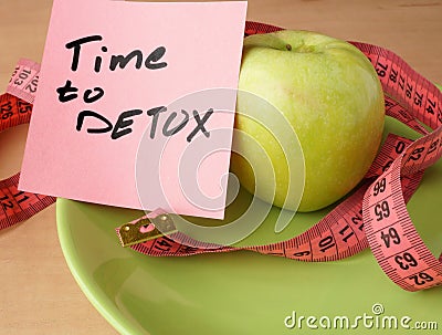 Paper with time to detox, apple and measuring tape. Stock Photo