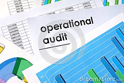 Paper with title operational audit and financial data. Stock Photo