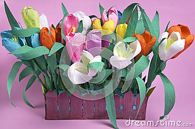 Paper tulip hand-made flowers on pink Valentines Day background. Spring holiday greeting card. Valentine, February 14 and 8 March Stock Photo