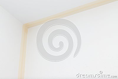 Paper wall painters tape to protect during painting the walls in home, tools for home renovation and repair Stock Photo