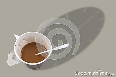 Paper white cup of coffee and time shadow Stock Photo