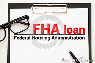 Paper with words fha loan Stock Photo