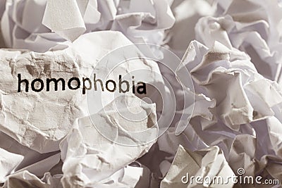 Paper written homophobia. Concept of old and abandoned idea or p Stock Photo