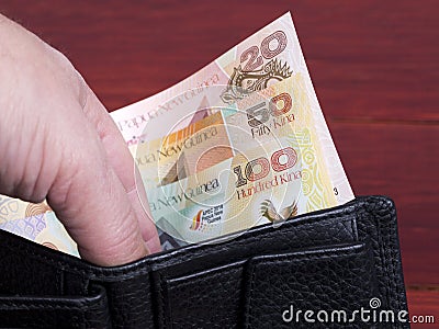 Papua New Guinean money in the black wallet Stock Photo