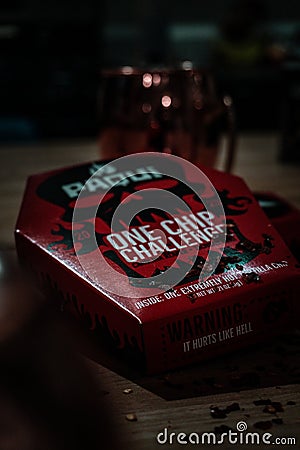 Paqui one chip challenge box. Dark aesthetic photo. Editorial Stock Photo