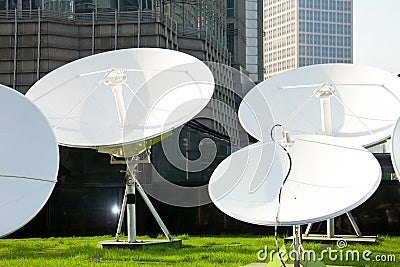 Parabolic satellite dish receivers Stock Photo