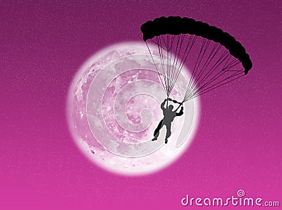 Parachutist in the moon Stock Photo