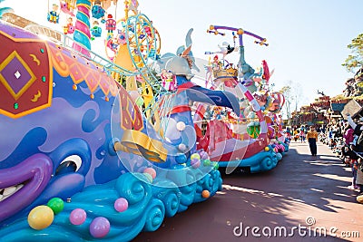 Parade of different colorful floats in DisneyWorld Editorial Stock Photo