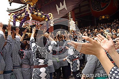 Parade Portable shrine in front of Sensoji Temple, Tokyo on May 15, 2004. Editorial Stock Photo