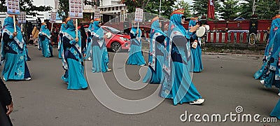 The parade welcomes the month of Muharram, participants walk and wear costumes. The parade welcomes the month of Muharram or Editorial Stock Photo