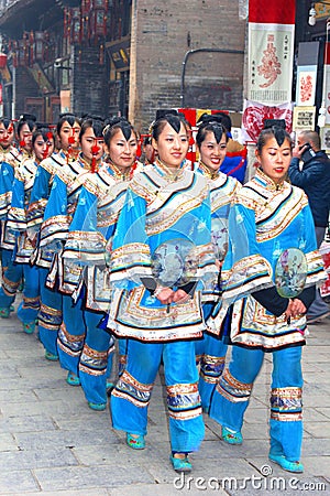 Parade of women in silk costumes, Pingyao, China Editorial Stock Photo