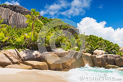 Amazing tropical beach with granite boulders on Grande Soeur Island, Seychelles Stock Photo