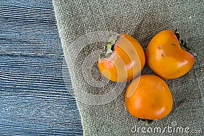 Paradise Palm fruit, mature paradise palm on the wooden floor Stock Photo