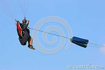 Paraglider being towed on a winch Stock Photo