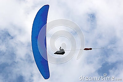 Paraglider being towed on a winch launch Stock Photo