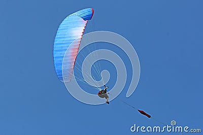 Paraglider being towed on a winch launch Stock Photo