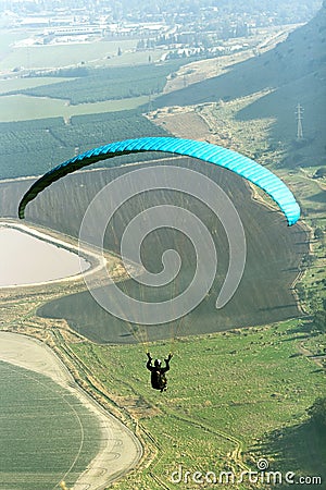 Paraglider flying Stock Photo