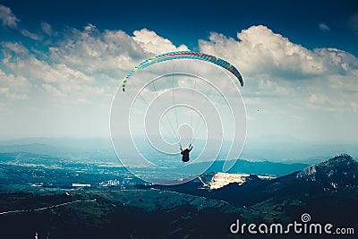 Paraglider flying Stock Photo