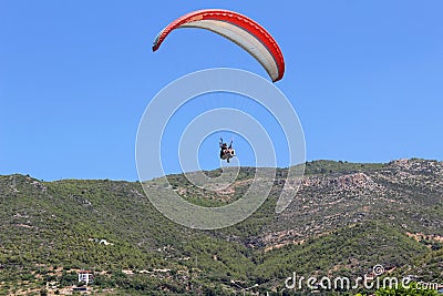 Paraglider landing in a special zone at Cleopatra Beach in Alanya Turkey Editorial Stock Photo