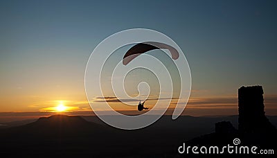 Paraglider in sunset Stock Photo