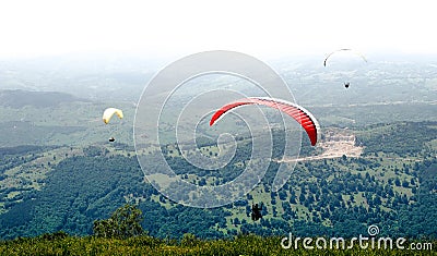 Paragliders flying in Romania Stock Photo