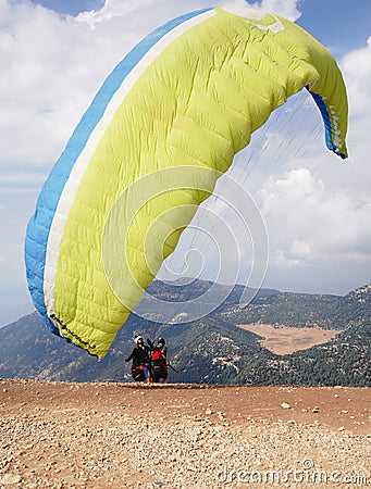 Paragliders preparing the equipment on Babadag for the launching / Ready to fly Editorial Stock Photo