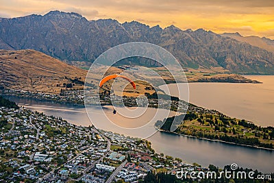 Paragliding over Queenstown and Lake Wakaitipu from viewpoint at Queenstown Skyline, New Zealand Editorial Stock Photo