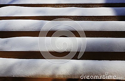 Parallel lines of melted snow on the wooden porch Stock Photo