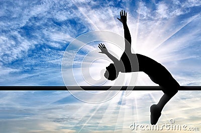 Paralympic handicapped with artificial limb jumps over the crossbar Stock Photo