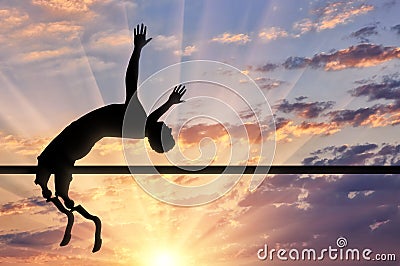 Paralympic handicapped with prosthetic jumps over crossbar Stock Photo