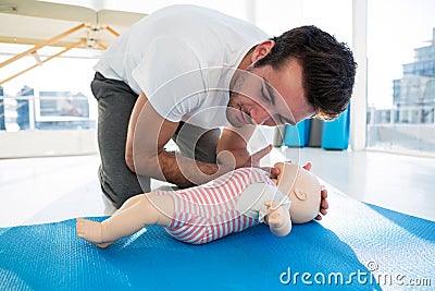 Paramedic practicing resuscitation on dummy Stock Photo