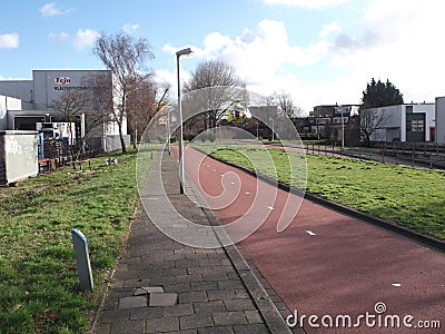 Paramedic trauma helicopter is landing on a very small strip of grass Editorial Stock Photo