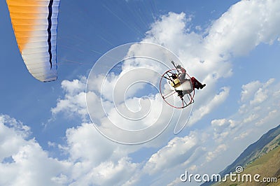 Paramotor on blue sky Stock Photo