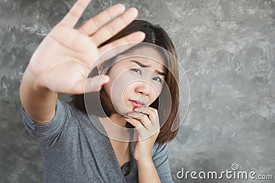 paranoid delusion with Asian woman feeling fear and panic attack Stock Photo