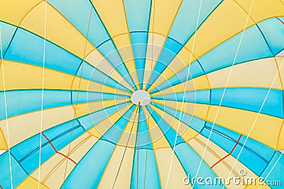 Parasailing, beach umbrella on sky background Stock Photo