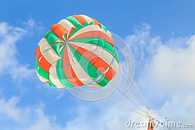 Parasailing, beach umbrella on sky background Stock Photo