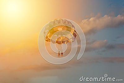 Parasailing during sunset. Stock Photo