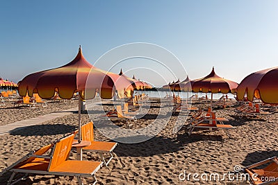 Parasols and sunbeds in Torre Pedrera near Rimini in Italy Stock Photo