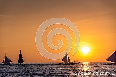 Paraw sailing at Boracay Island, Philippines at Sunset Editorial Stock Photo