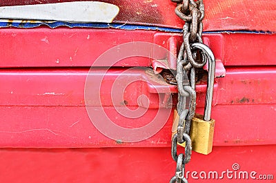 Parcel with chain and padlock Stock Photo