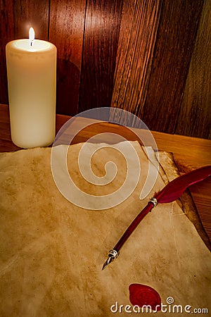 Parchment with wax seal and candle Stock Photo