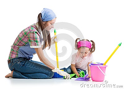 Parent teaches daughter child cleaning room Stock Photo